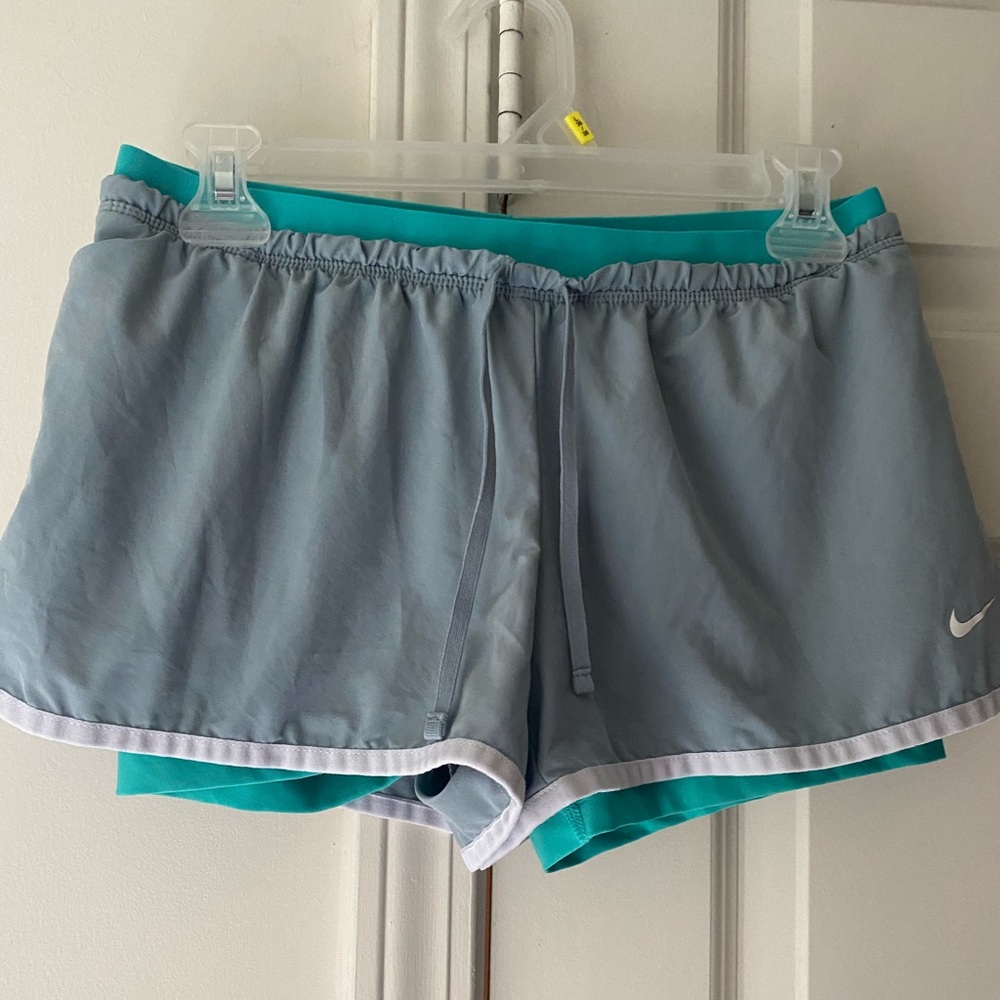 Nike dry fit shorts grey with white logo size Medium..great condition